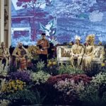 Gubernur Jambi Al Haris memberikan kata sambutan mewakili keluarga besar CE dan kedua mempelai untuk tamu yang hadir. Foto: Riky Serampas/Pariwarajambi