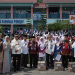 Penyerahan bantuan pendidikan program Dumisake untuk Kota Sungaipenuh. Foto: Erik/Pariwarajambi